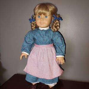 Adorable Doll in Blue Dress with Pink Apron